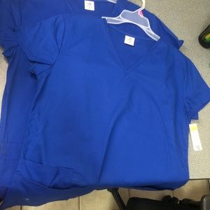 Lot of 2. Scrub tops. Royal blue. New w tags siz M